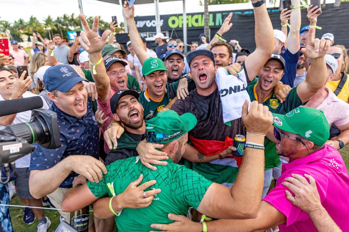A crowd at LIV Golf South Africa celebrating together