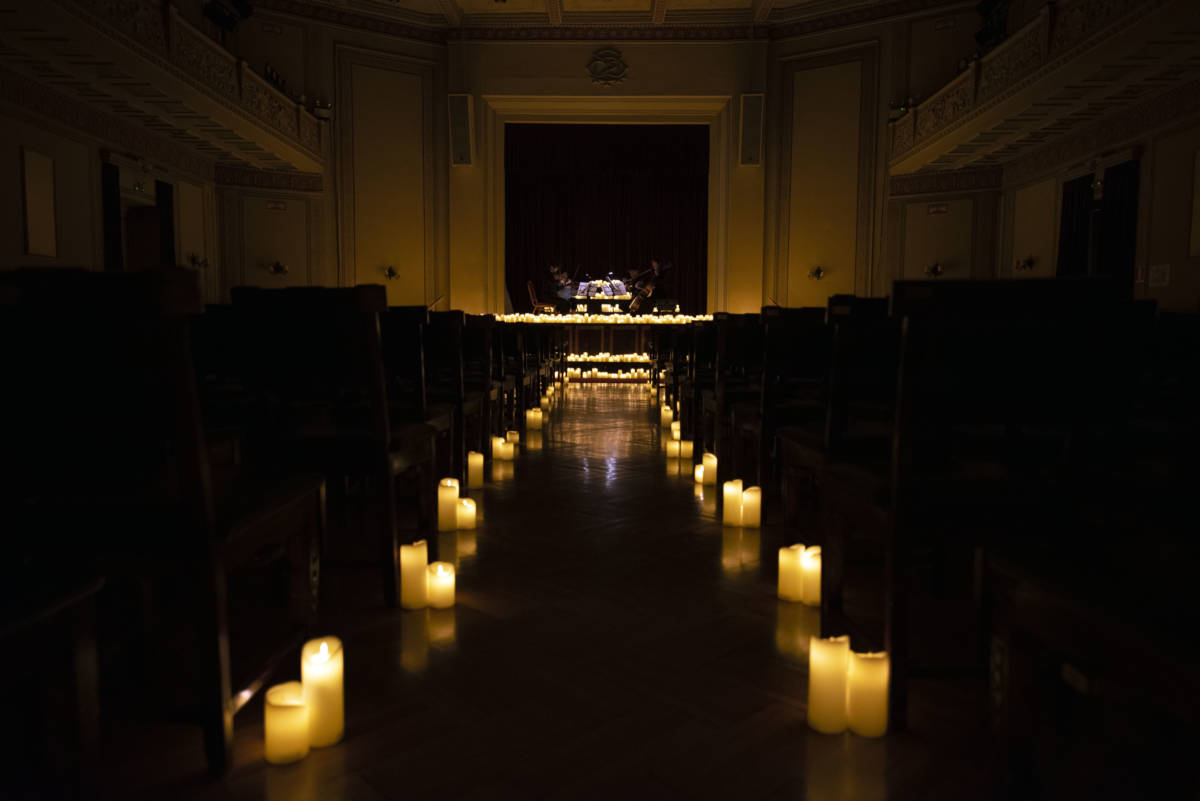 candles lighting up central hall in athens