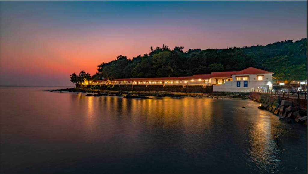 Aguad Fort and Jail Complex by night, overlooking the Arabian Sea