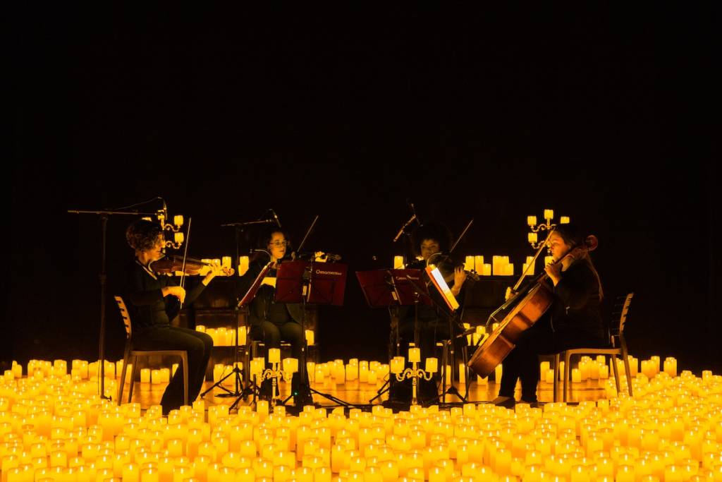 A string quartet performing at a Candlelight concert