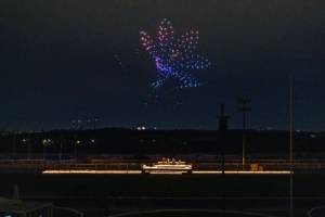 Drones light up the sky over a string quartet