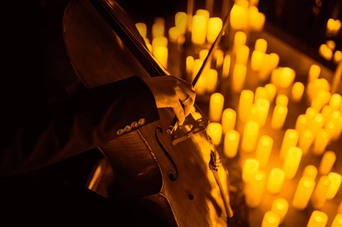 candles and violin at candlelight concert