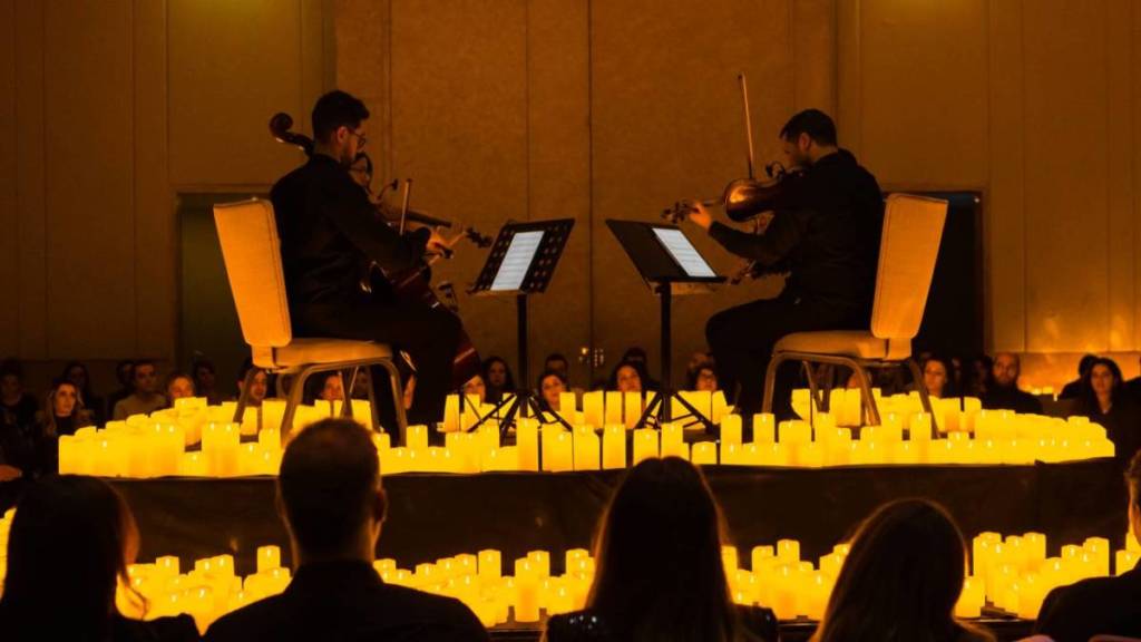 Classical musicians performing at a Candlelight concert