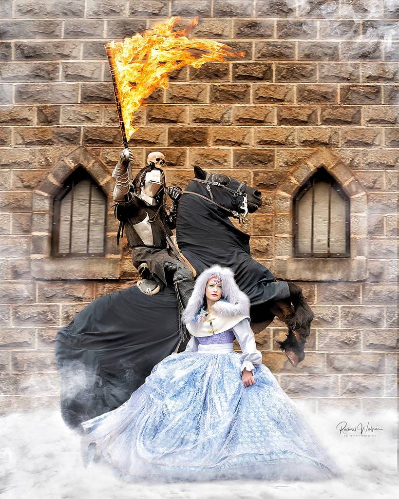 knight with fiery sword and snow queen at Kryal Castle