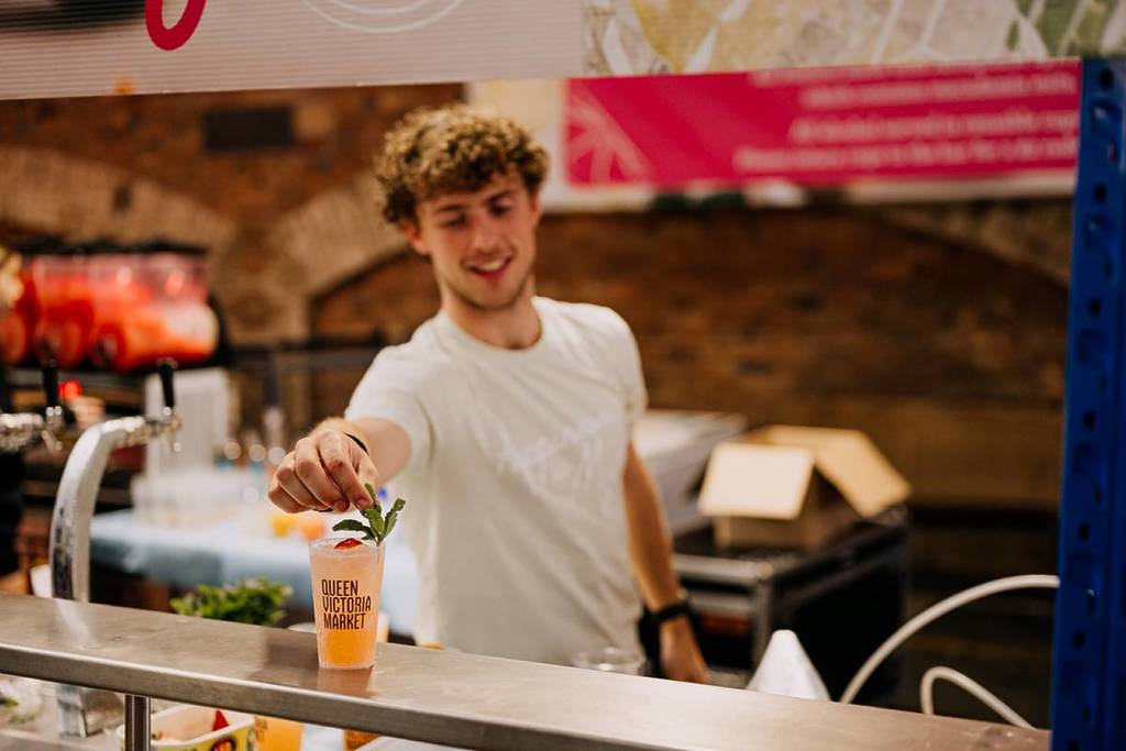 man serving a refreshing cocktail at Summer Night Market