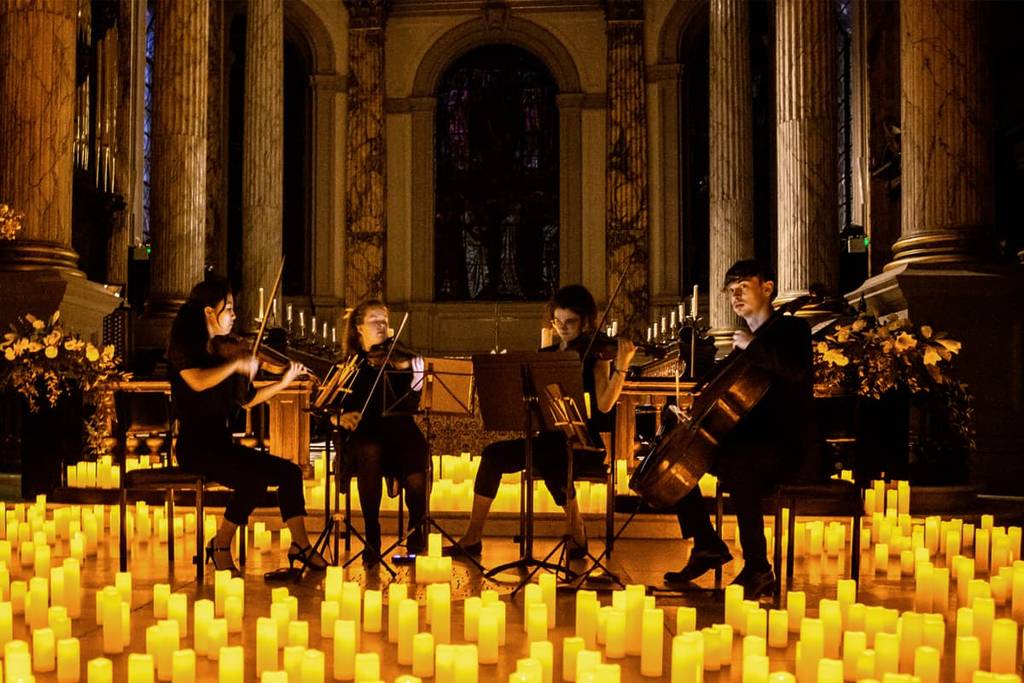 A string quartet playing at a Candlelight concert