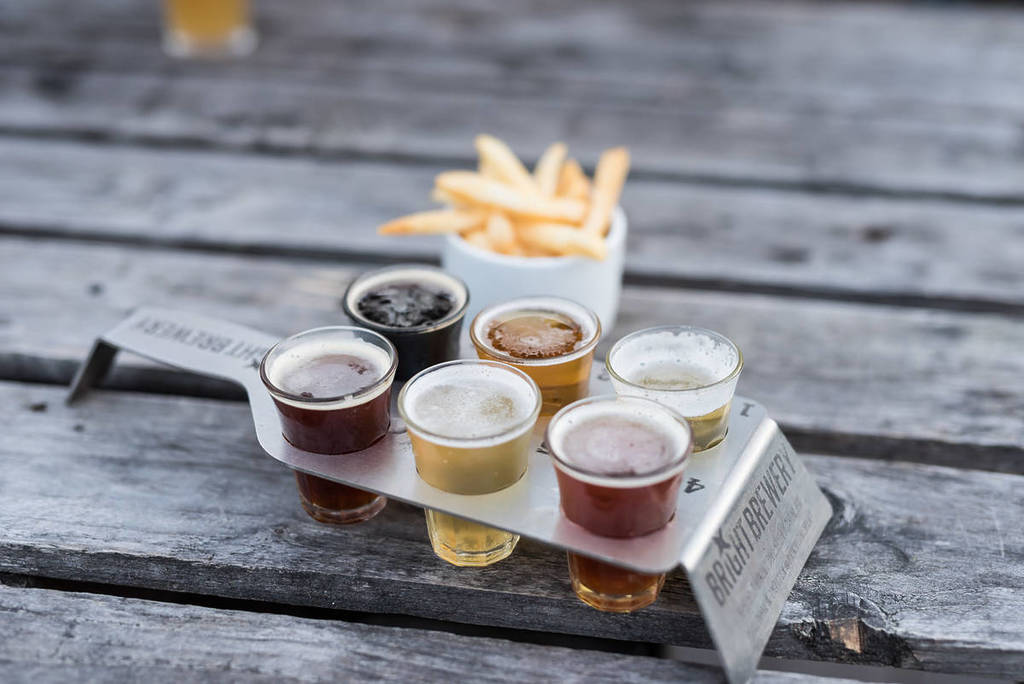a flight of beer and some chips from Bright Brewery