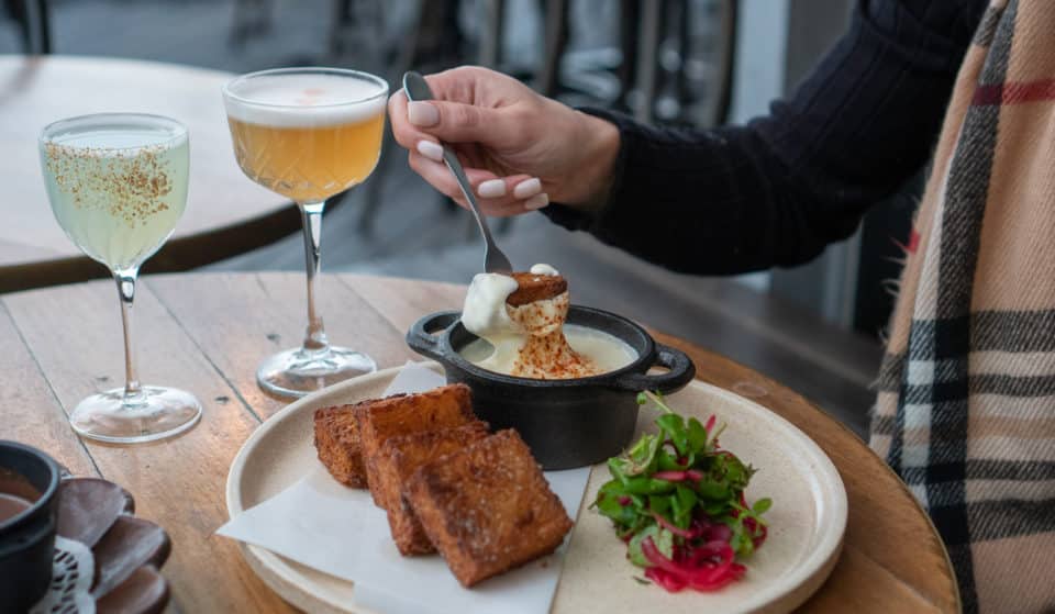 Warm Up This Winter With $15 Fondue And Cocktails At Transit Bar