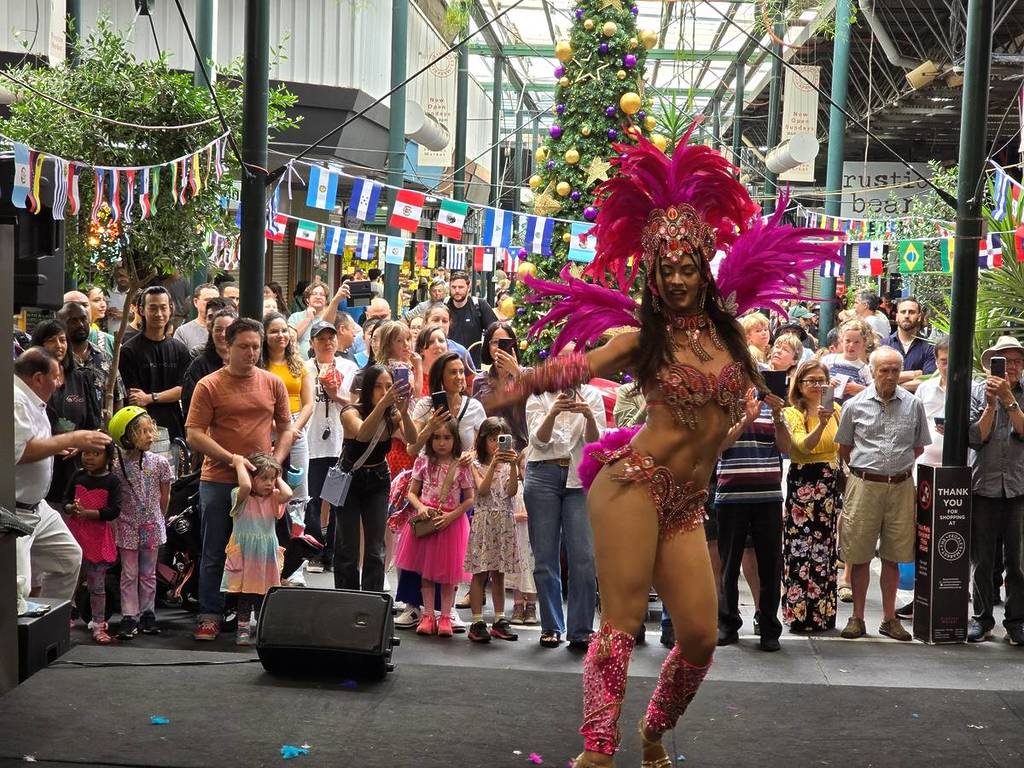 woman dancing for Latin Day at Preston Market