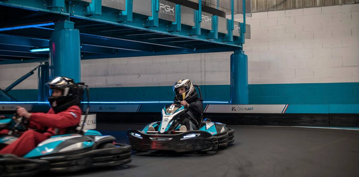 people go kart on indoor track