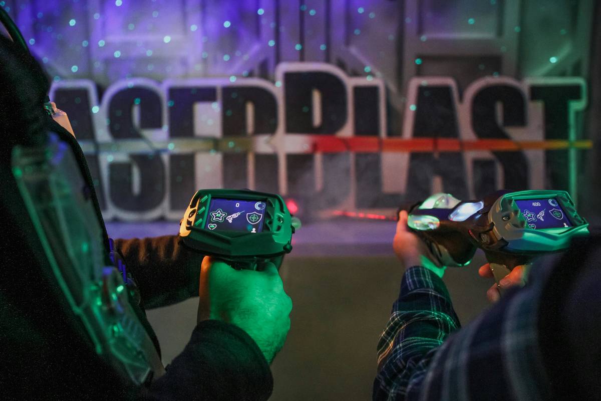 two guns at laser tag