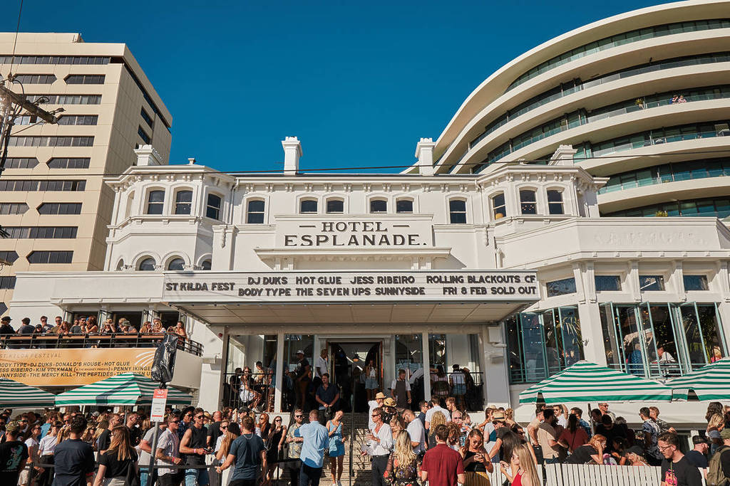 people outside Hotel Esplanade on a sunny day