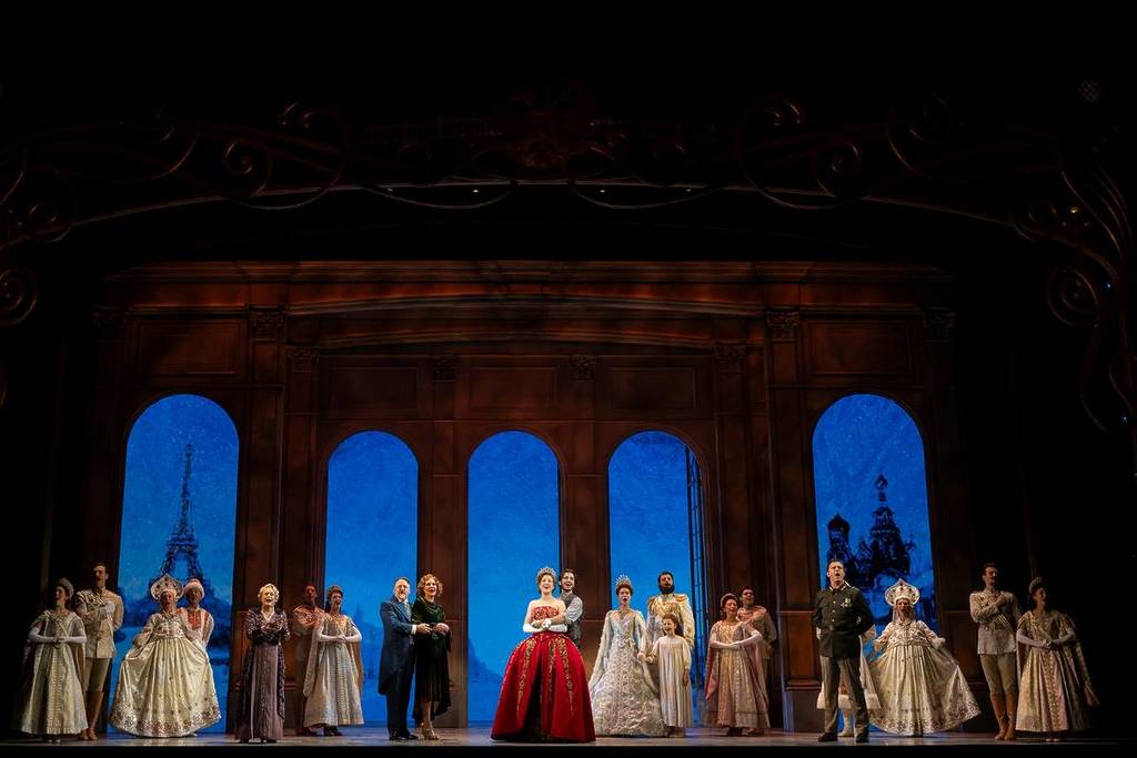 cast of Anastasia musical wearing lavish costumes for a ball