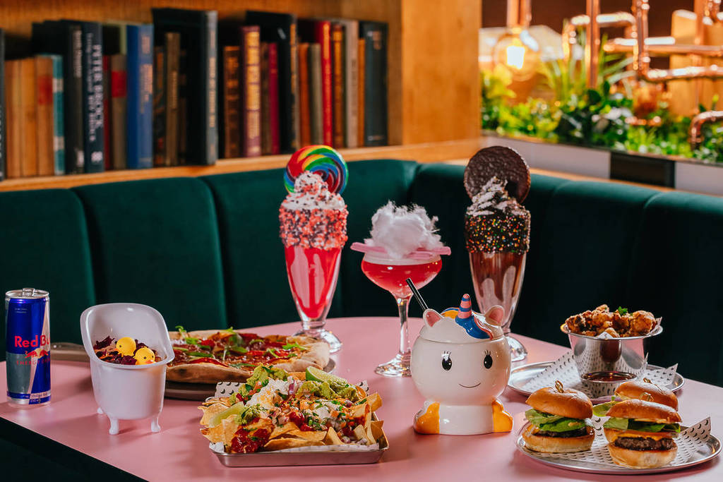 fun drinks like milkshakes and food like burgers at Hijinx Hotel and Cirque Electriq