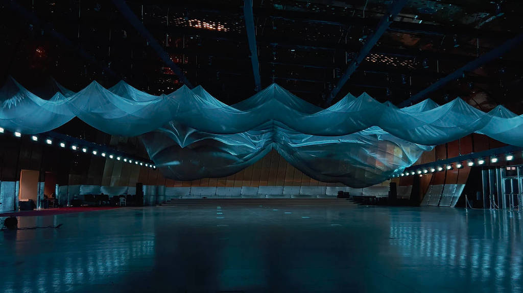 Einder art piece by Boris Ackett, a flowing dark installation for Now or Never