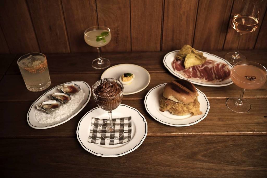 A selection of food and drink dishes from the winter menu at Heavens Above, the winter pop-up at Good Heavens cocktail bar.
