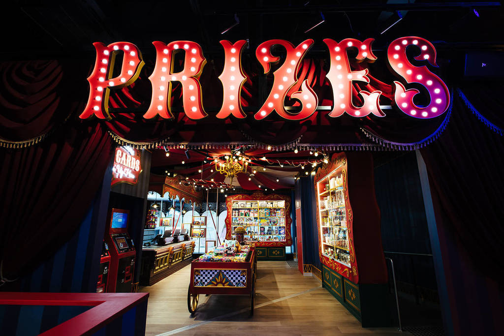entrance to a room in Archie Brothers with a big sign that says 'prizes'