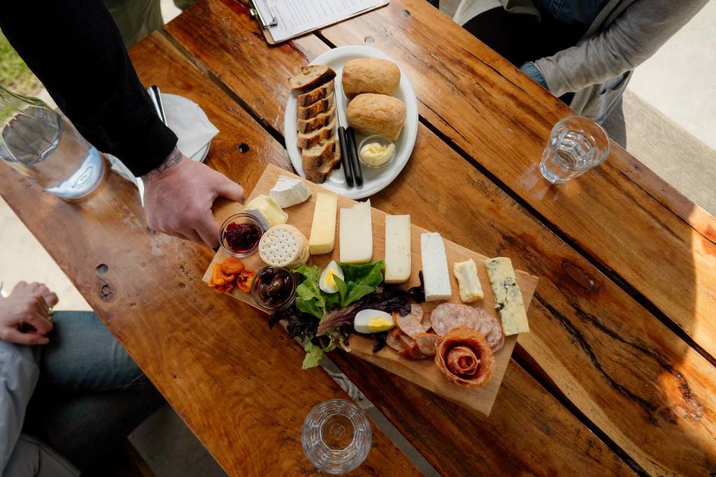a selection of cheese on a table that you might be able to try at Eat Drink Play Gippsland