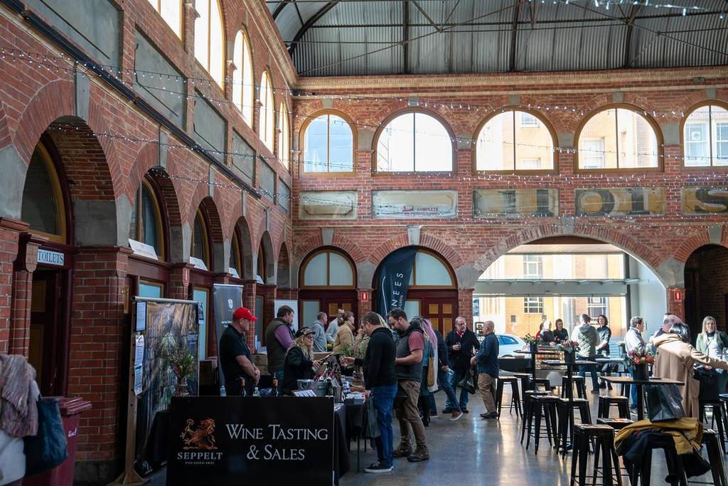 people tasting wine from producer at Red Series