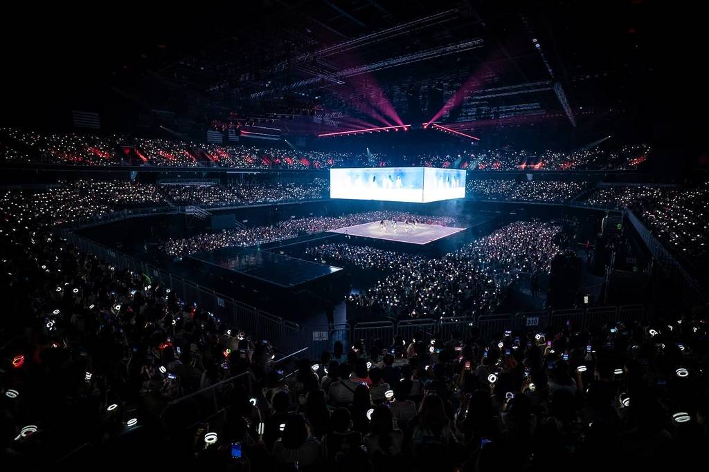 wide shot of the 360 degree stage in an area during a Twice concert