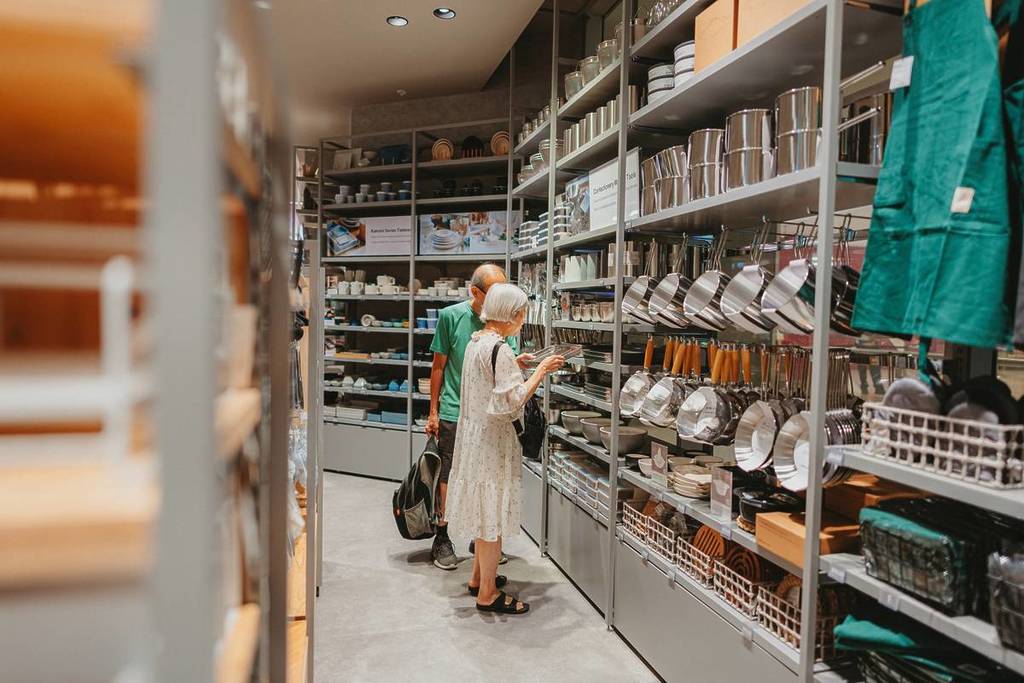 a couple looking at kitchen items in Standard Products store