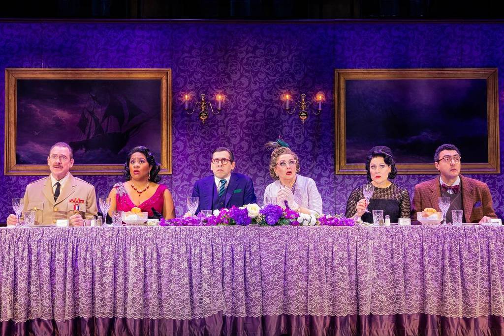 cast of Cluedo sitting at dinner table