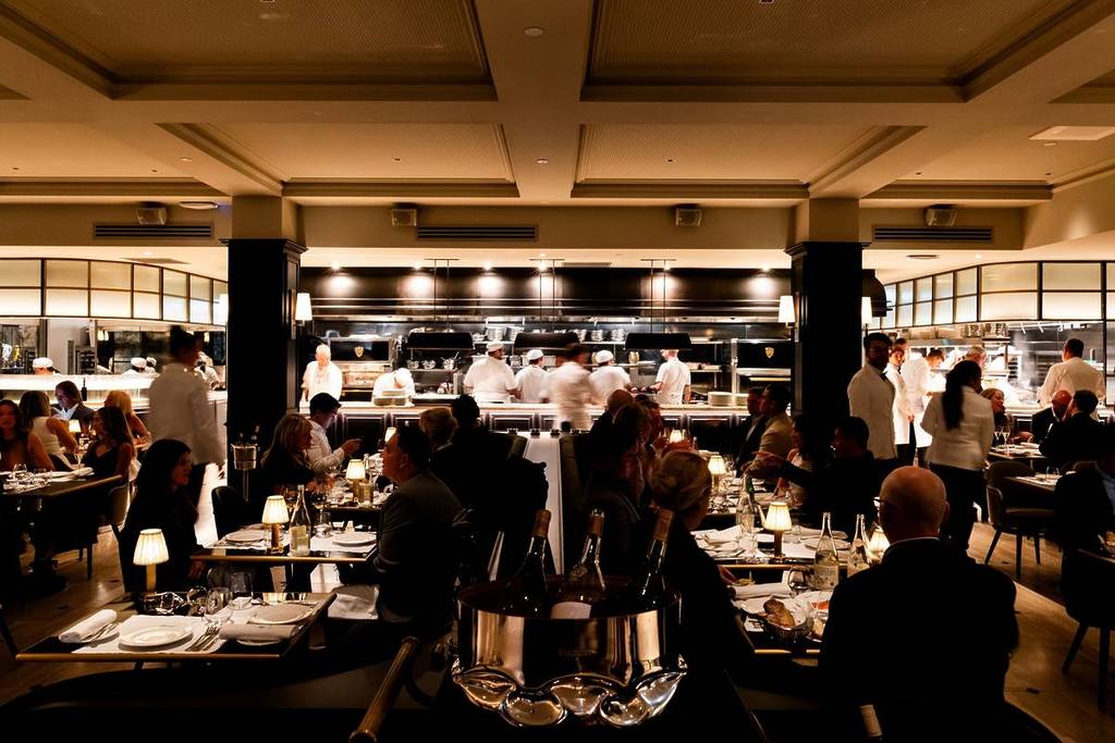 people in dining room of Maison Batard