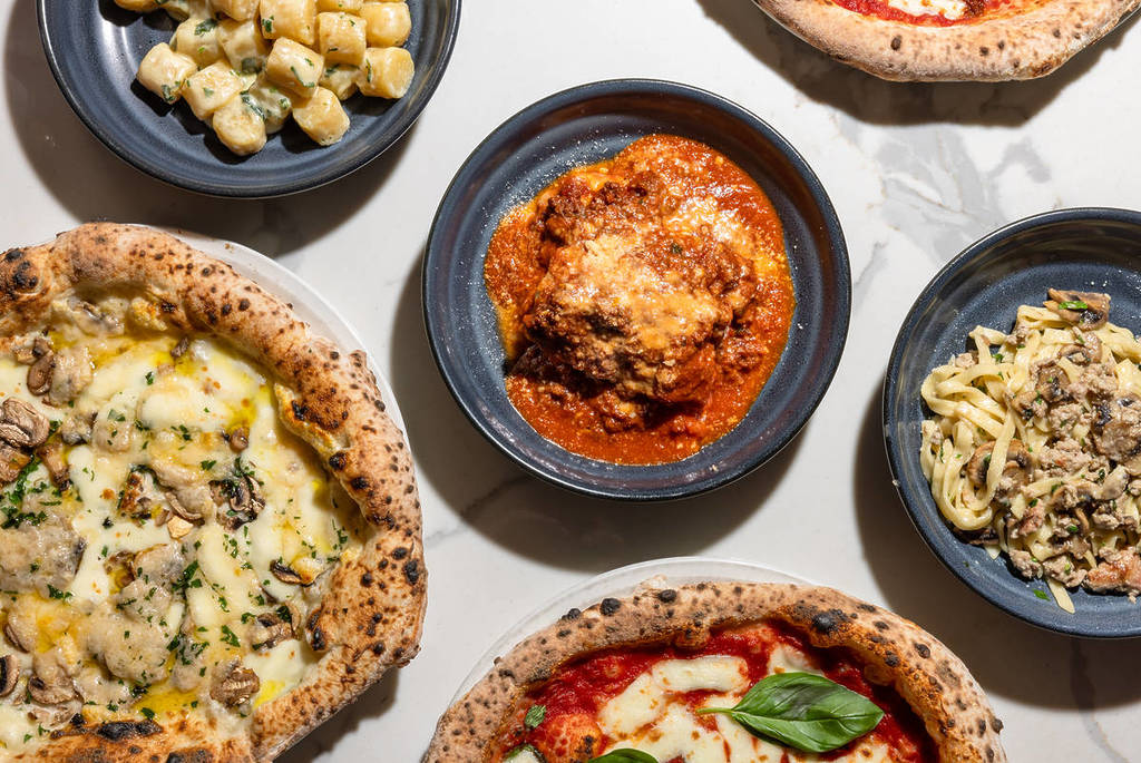 selection of pizza and pasta dishes at Shop225