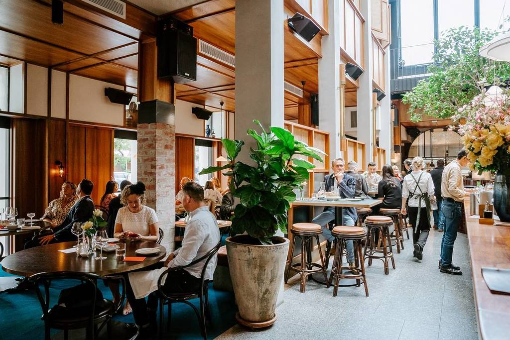 people dining inside Albert Park Hotel