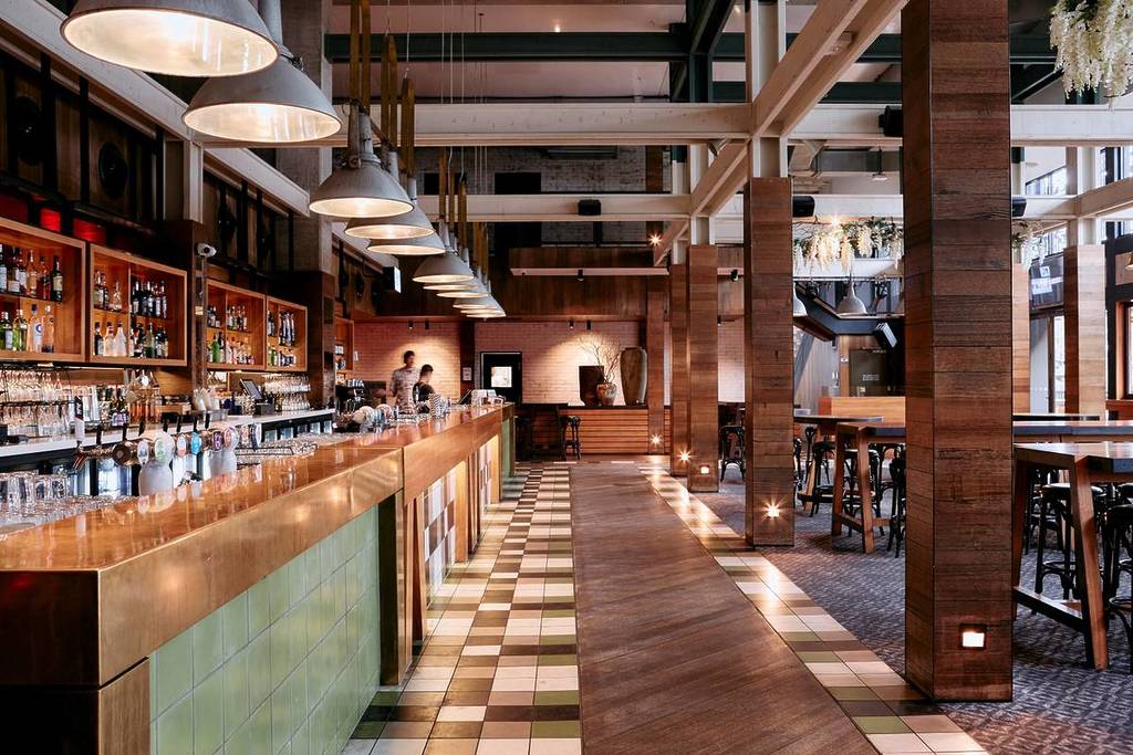 inside of Melbourne Public showing the bar area