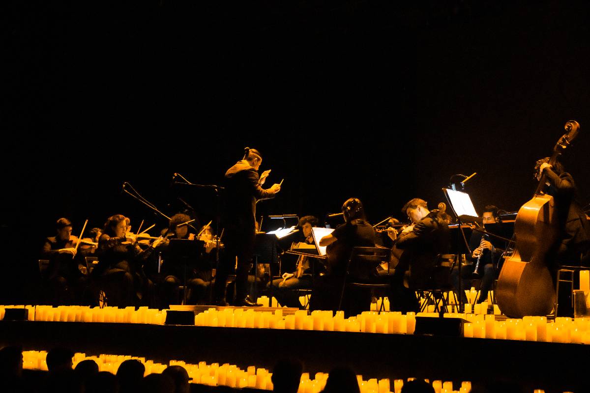 An orchestra performing at a Candlelight concert