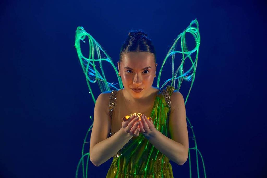 A ballerina dressed as Tinker Bell for Ballet of Lights