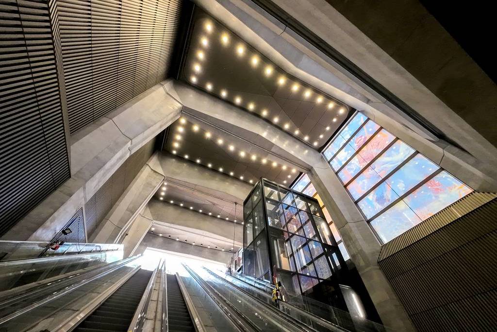 escalators at entrance to State Library station
