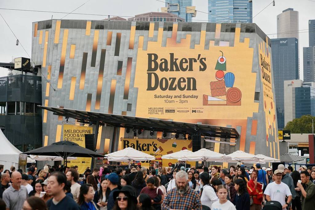 people at Fed Square browsing stalls for Baker's Dozen