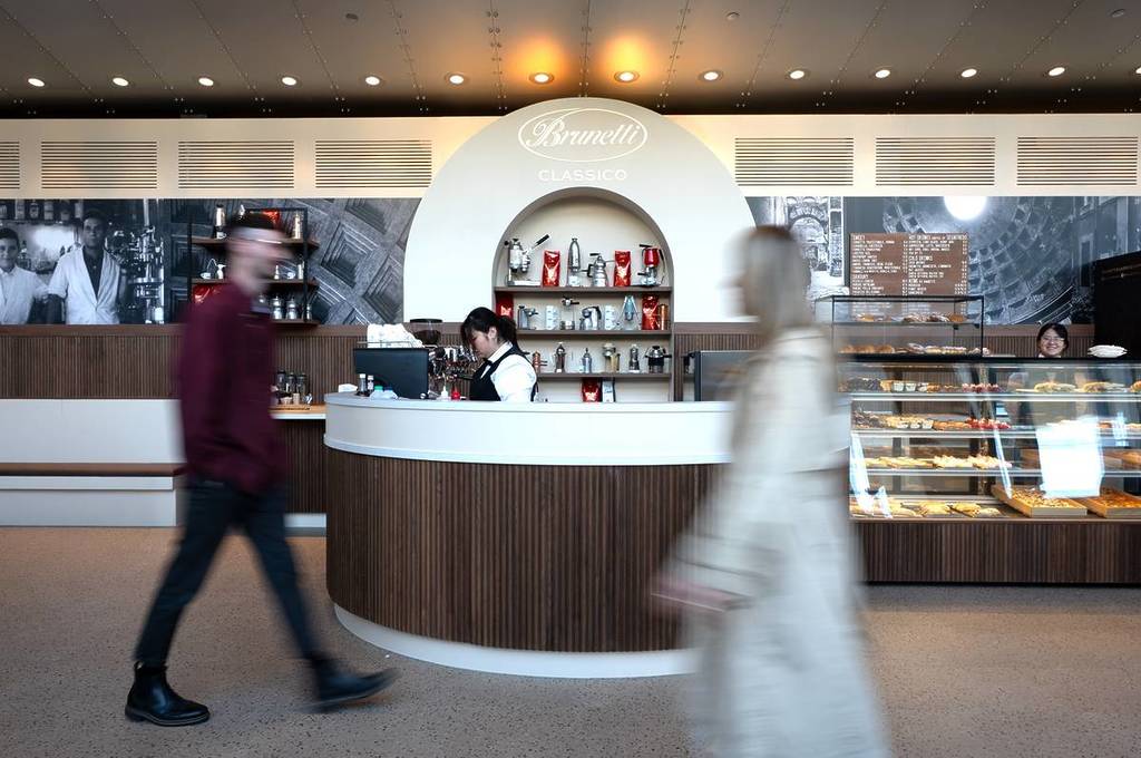 people walking past Brunetti Classico in Melbourne Museum