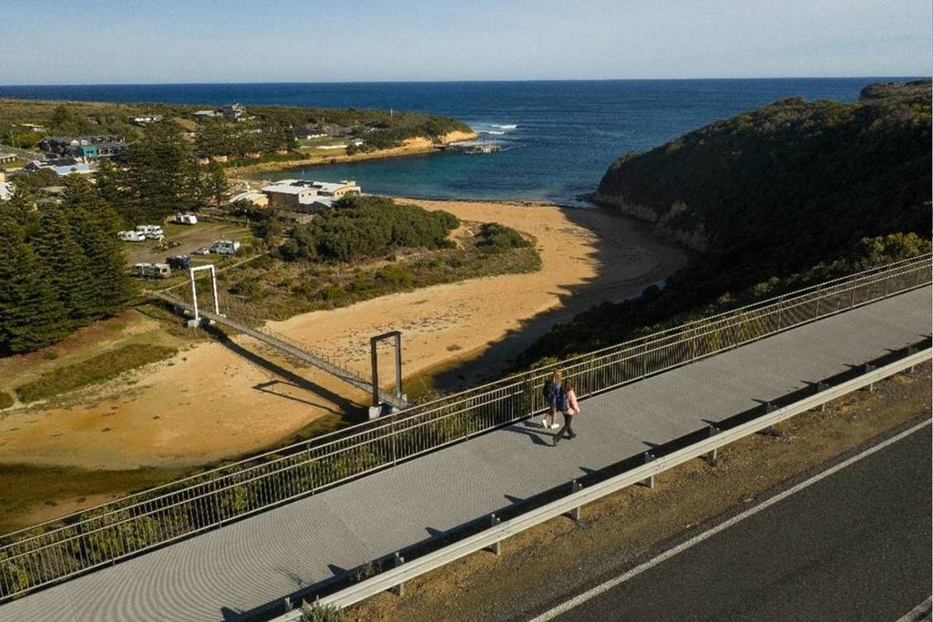 two people walking on the Poorpa Yanyeen Meerreeng above Port Campbell