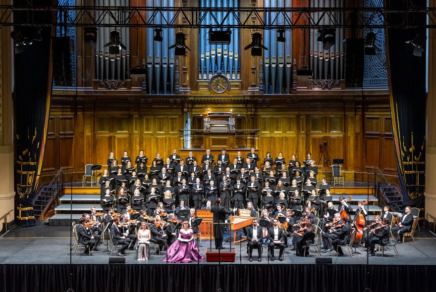 Royal Melbourne Philharmonic performing at the legendary Melbourne Town Hall stage underneath its three-story organ