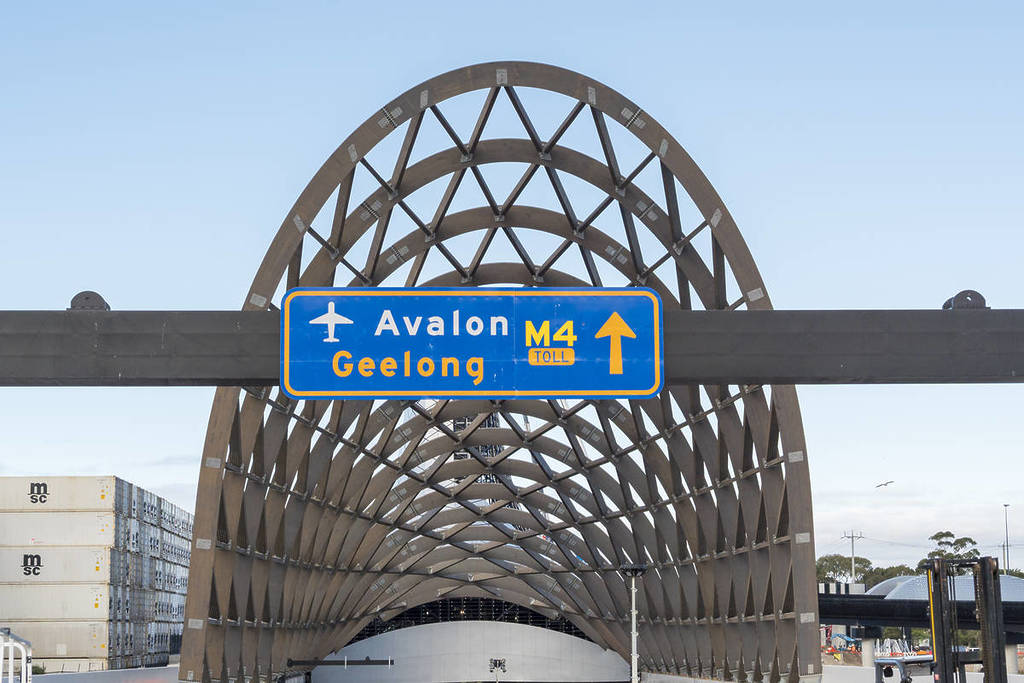 entrance to West Gate Tunnel, with toll signs pointing the way to Avalon and Geelong