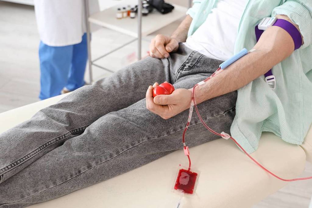 man donating blood
