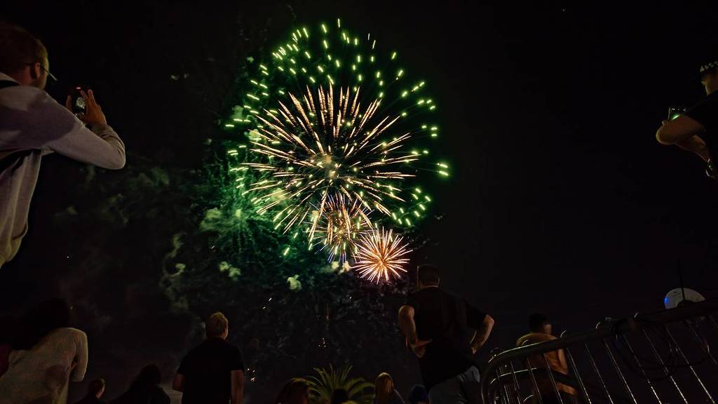 people looking up at the fireworks in Footscray Park