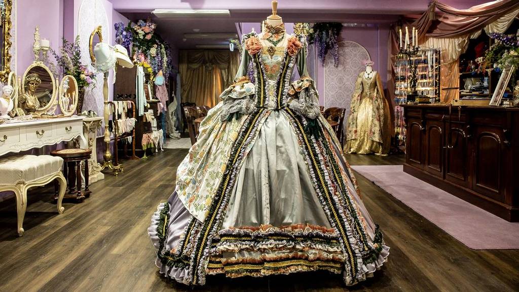 ballgown on a mannequin and fancy décor at the Bridgerton Masquerade Parlour