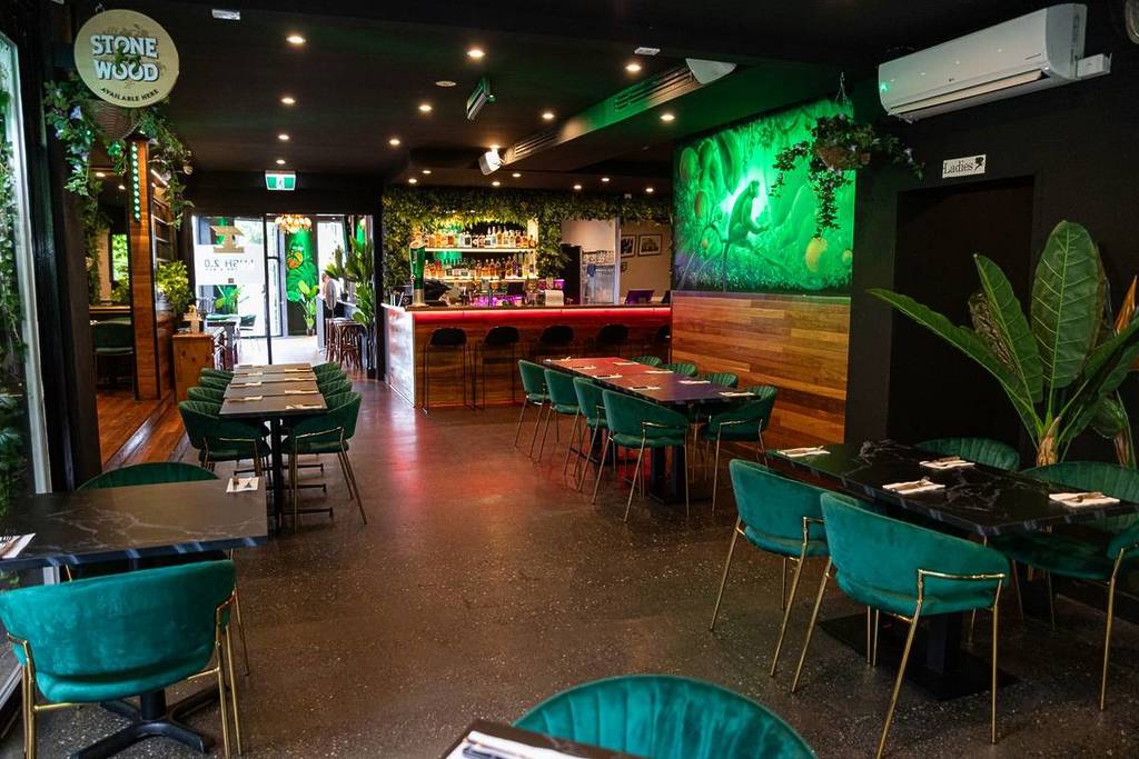 Lush green interiors at Lush 2.0 with seating and on-tap