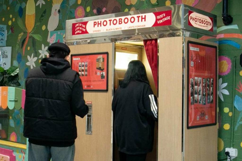 people entering the photobooth at South Melbourne Market