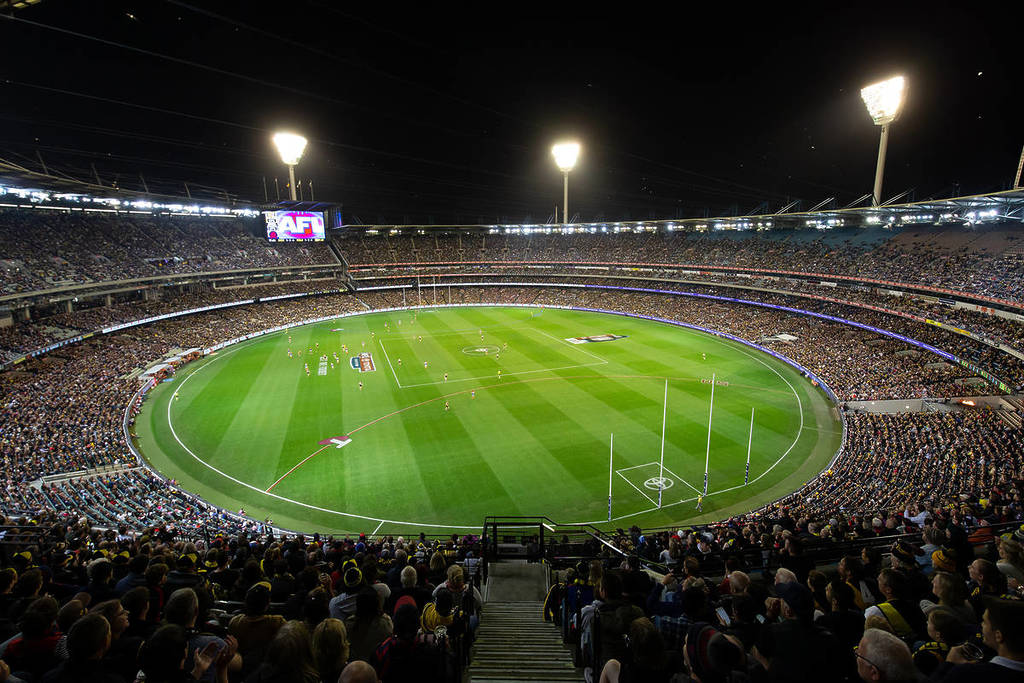 view from the crowd of the MCG field at night