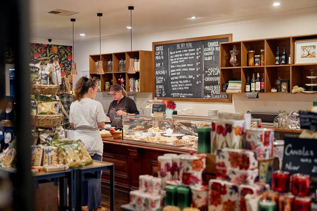 customer at the counter for Harcourt Produce & General Store