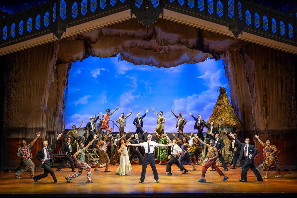 cast of Book of Mormon during a dance number