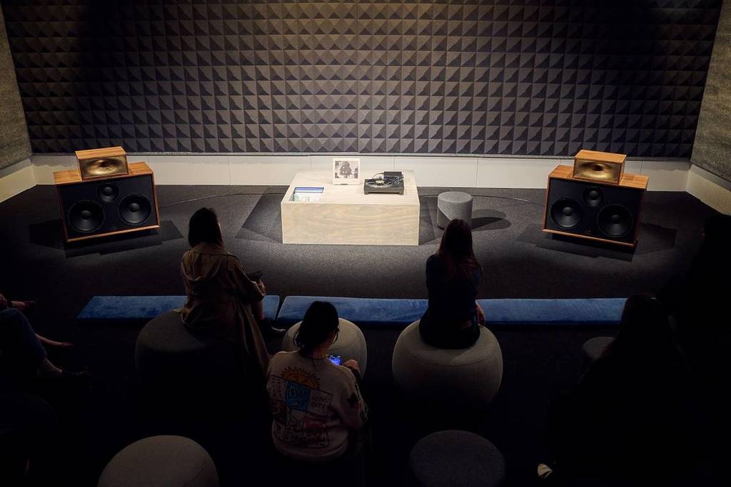people in the Listening Room in the Reverb exhibition