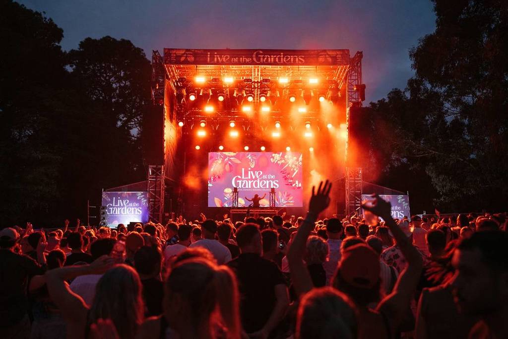 crowds under the lights at live at the garden