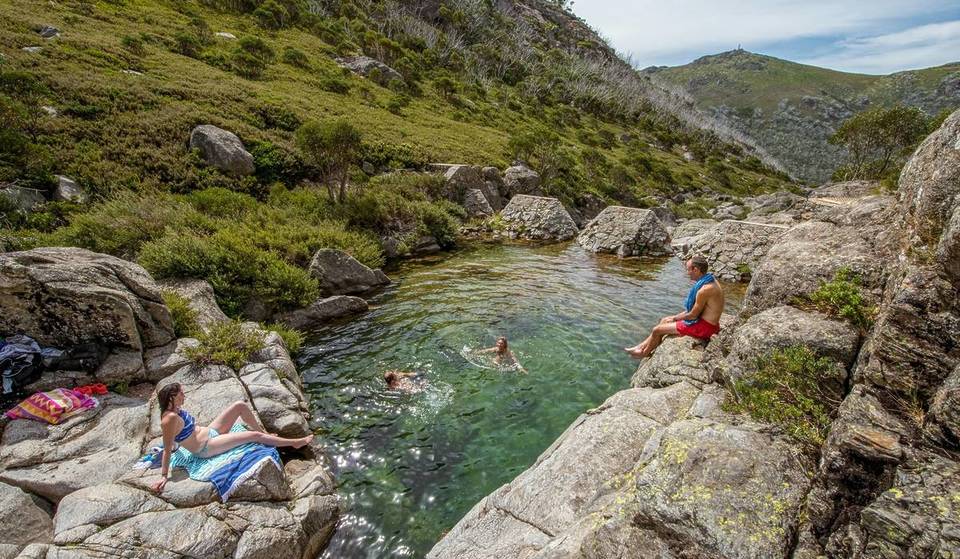 This Secluded Swimming Hole Is Hidden Just 15 Minutes Away From Falls Creek, With Crystal-Clear Waters And Views Of Rugged Mountains