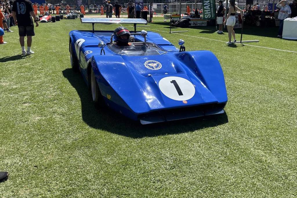 blue car with number one on it